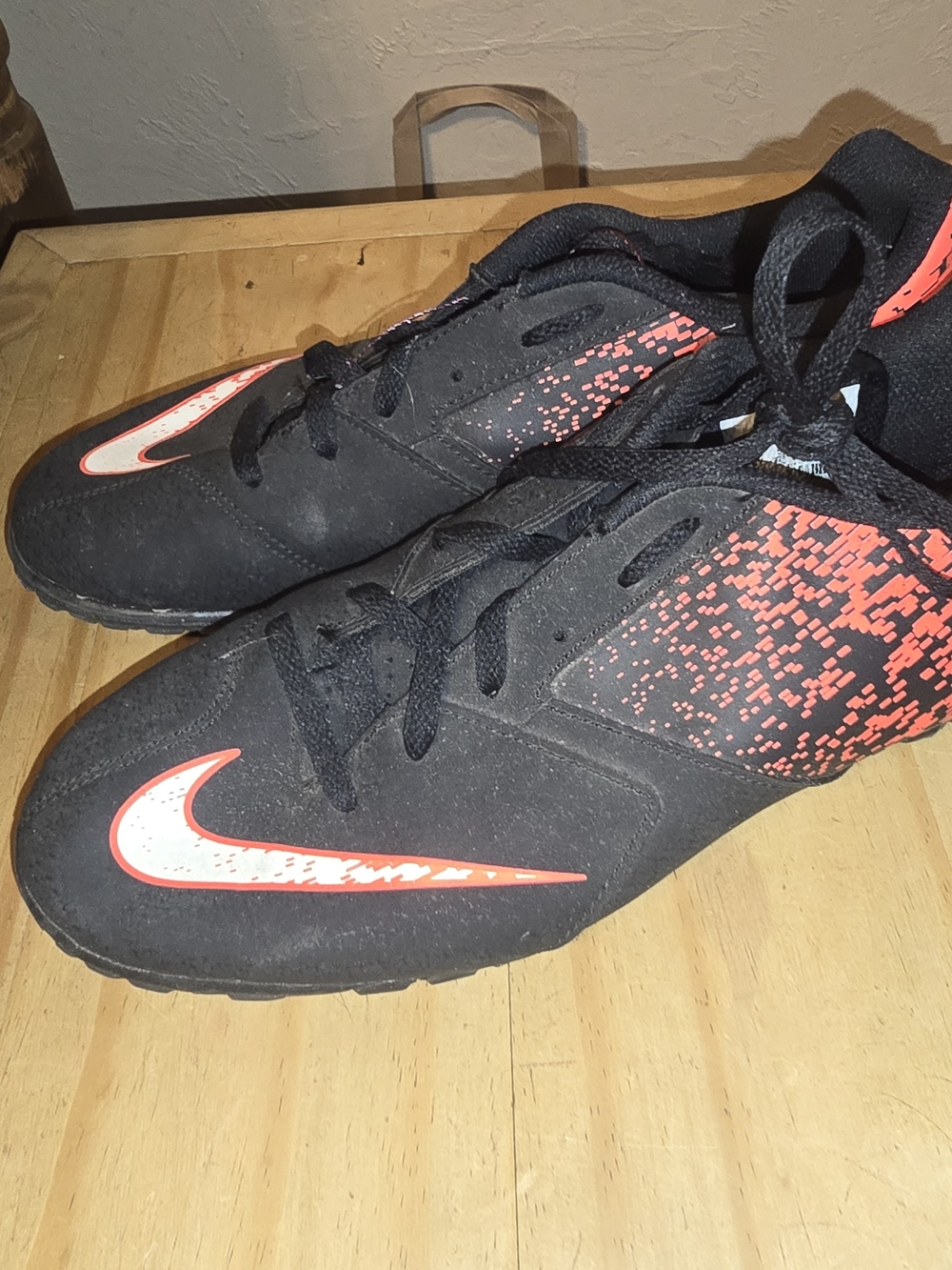 Nike Men’s Black Athletic Cleats with Red Accents